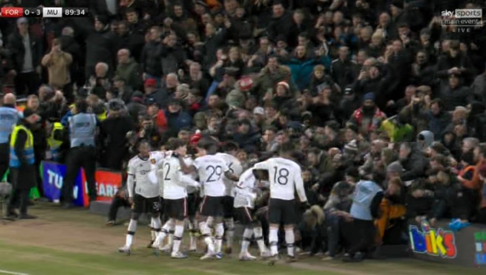 Supporters were left on their hands and knees behind the pitch