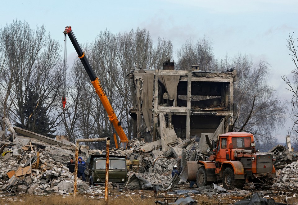 Clear-up begins at the scene of the attack after the Ukrainian missile strike