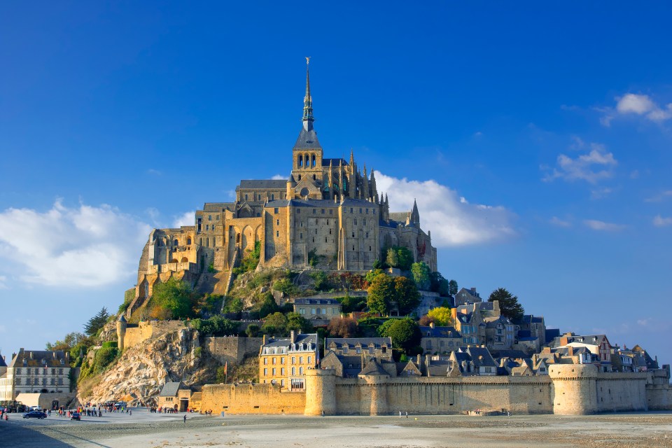 Break to Europe’s best spots with Hols from £9.50 - pictured The Abbey of Mont Saint-Michel in Brittany