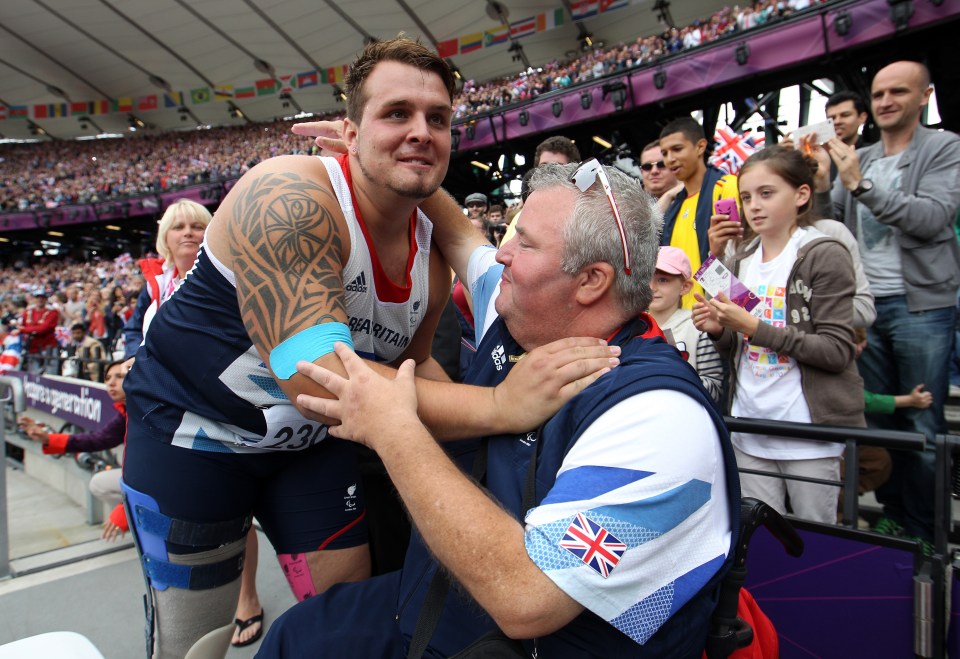 Legendary Paralympic athlete and coach Anthony Hughes, right, passed away aged 63