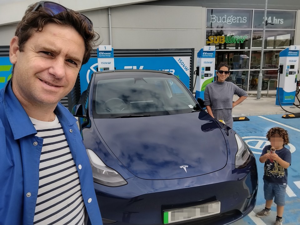 Alex and family charging the Tesla