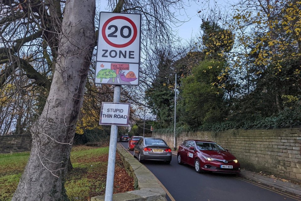 Angry locals have put up their own sign warning of a ‘stupid thin road’