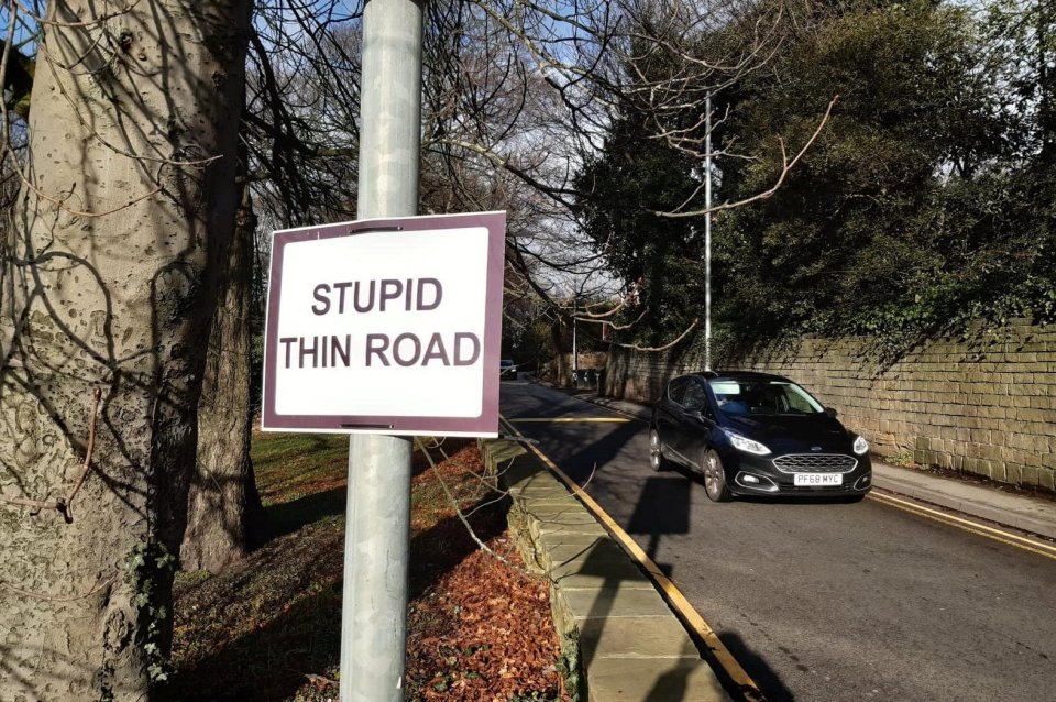 Locals put up the sign hoping to cut the number of crashes on the road