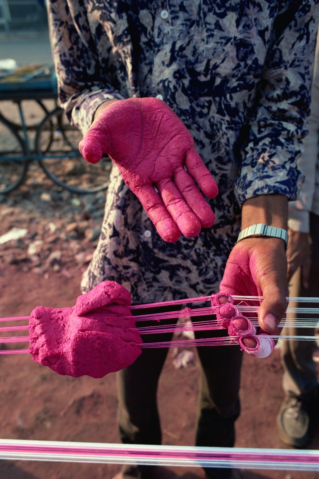 Kite strings are coated in powdered glass for the battle in Gujarat