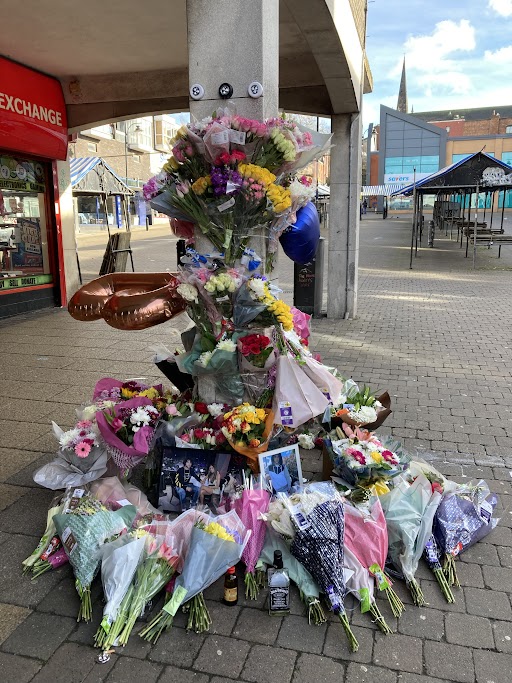 Flowers left at the scene following the 'targeted attack'