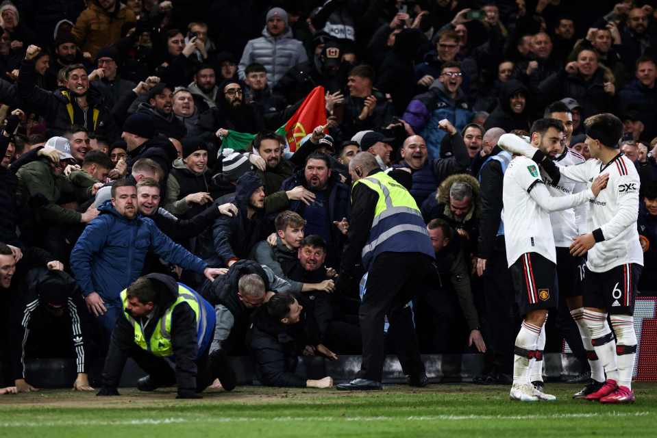 Manchester United fans were celebrating their third goal