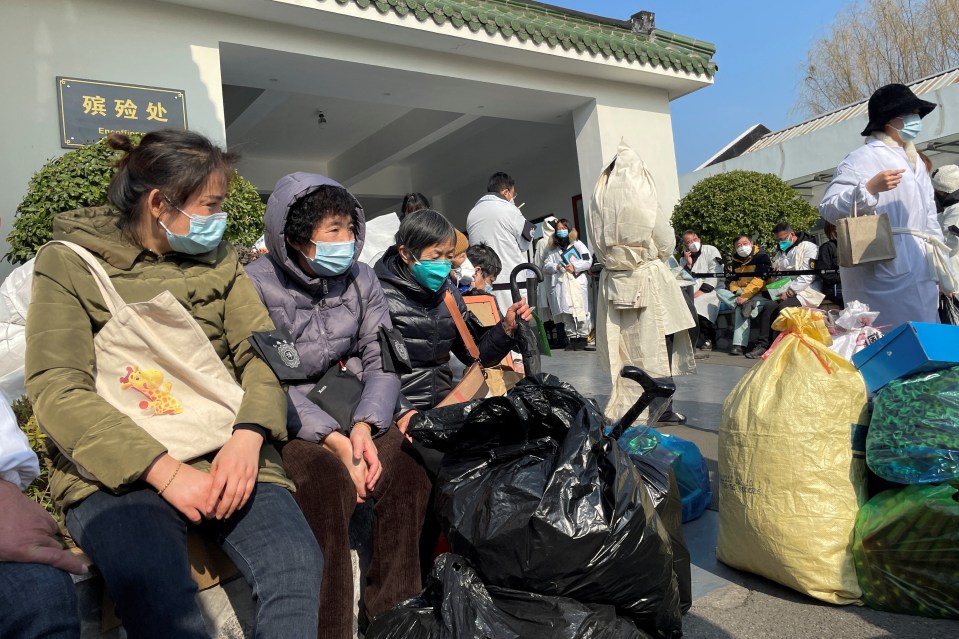 Mourning families wait to dispose of loved one's bodies as China's government scrambles to deny the crisis is spiralling