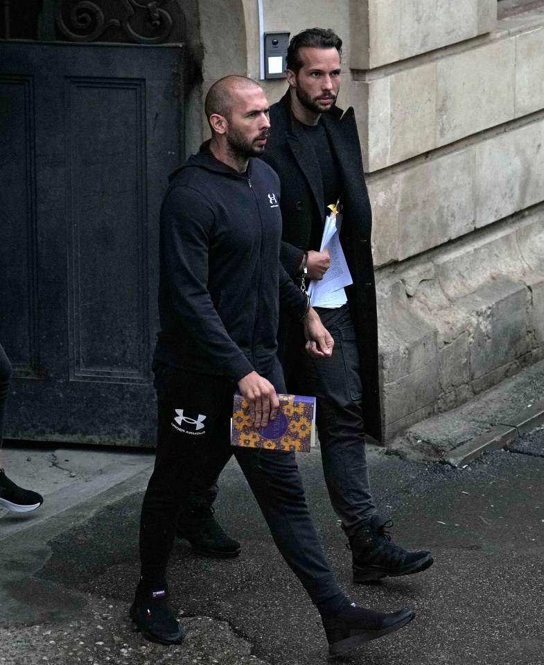 Andrew Tate and his brother Tristan leaving court in Romania