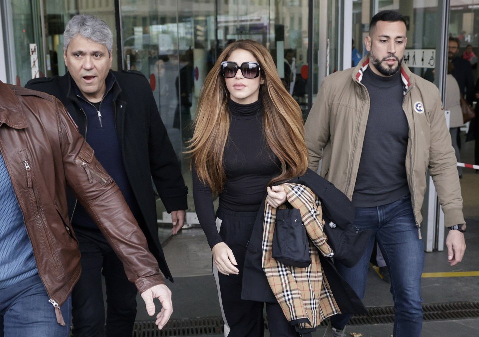 Shakira at court last month to sign divorce papers