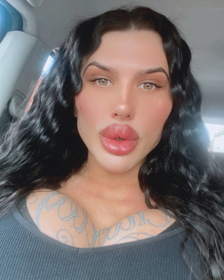 Sofia Lips flaunts her "humongous pout" while driving around Manchester