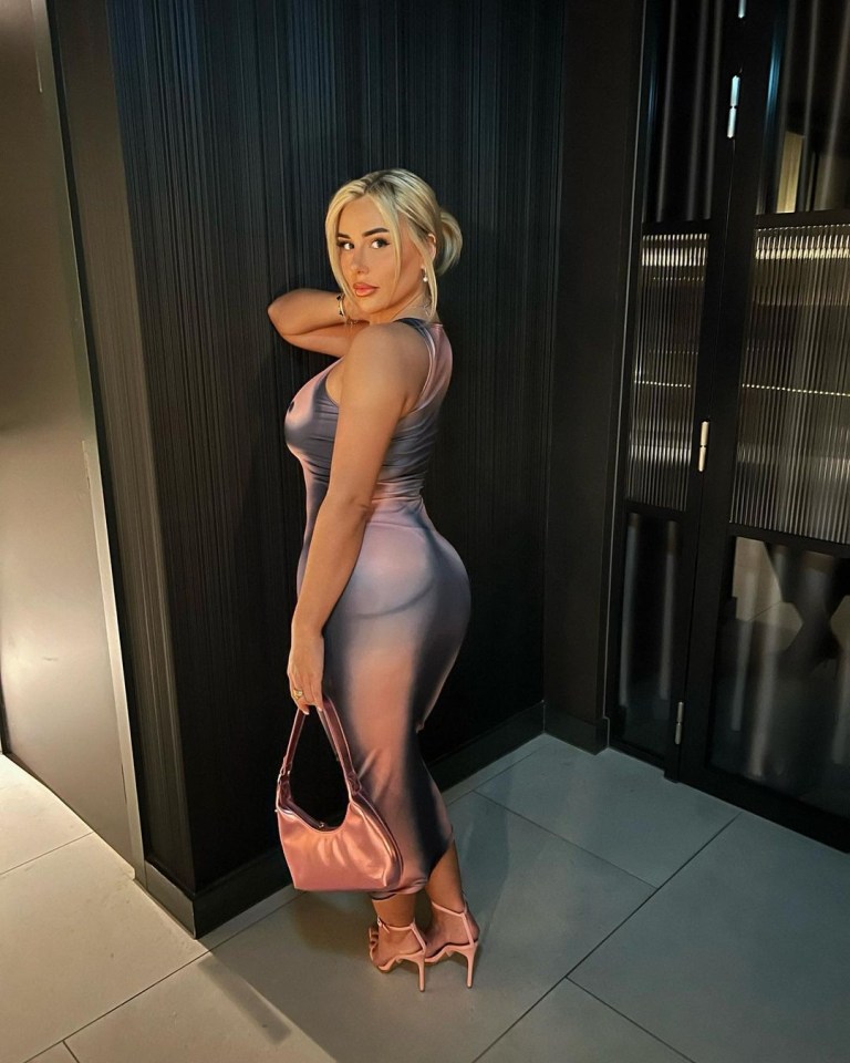 The reality star showcased her trim figure in the skintight maxi