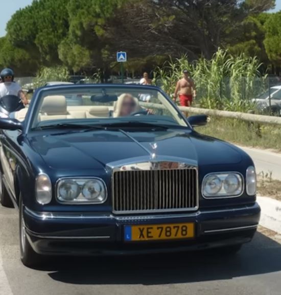 Svetlana behind the wheel of the one of the couple's two Rolls Royces