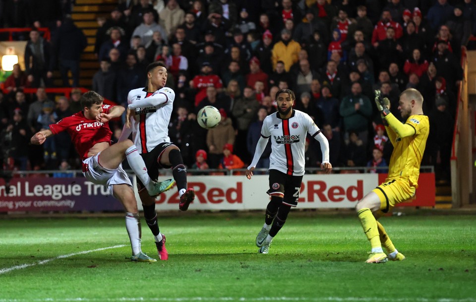 James Jones scooped in an equaliser for Wrexham after they fell 1-0 behind