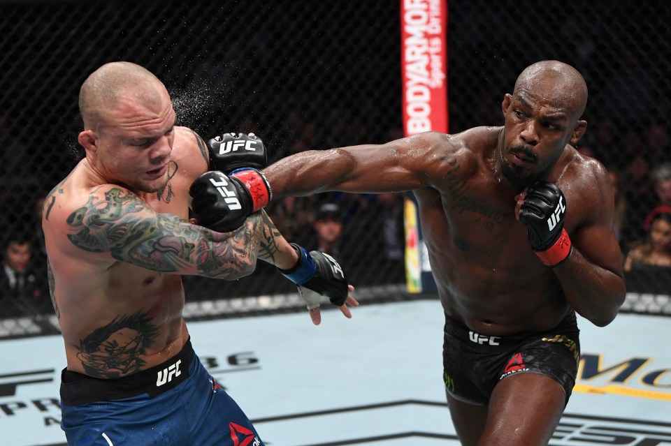 Jon Jones, seen landing a fierce blow on Anthony Smith in 2019, could finally return to the Octagon after three years out in March