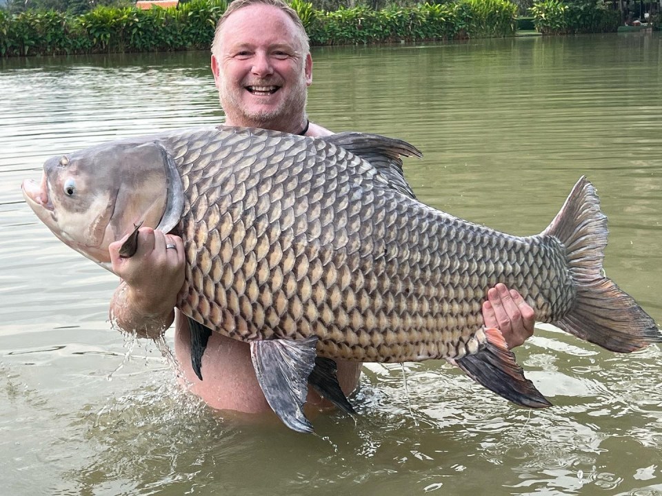 This Manchester United Treble winner looks unrecognisable enjoying his fishing holiday in Thailand at the Jurassic Mountain Resort