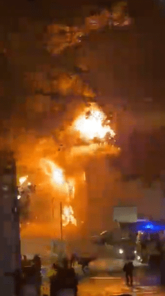 Flames soared as firefighters tried to control the blaze