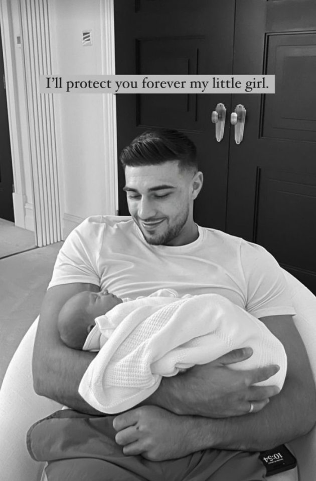 Tommy vowed to protect his daughter in a sweet photo cradling the baby