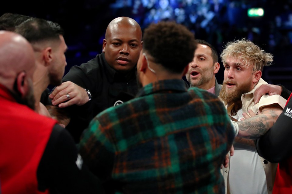 Jake Paul and Tommy Fury had to be separated after a fiery ring confrontation