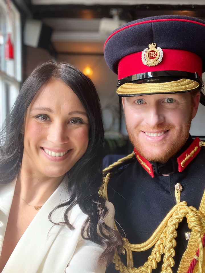 A Meghan Markle lookalike next to Rhys