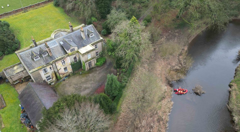 Police have been searching the perimeter of an abandoned house opposite the bench