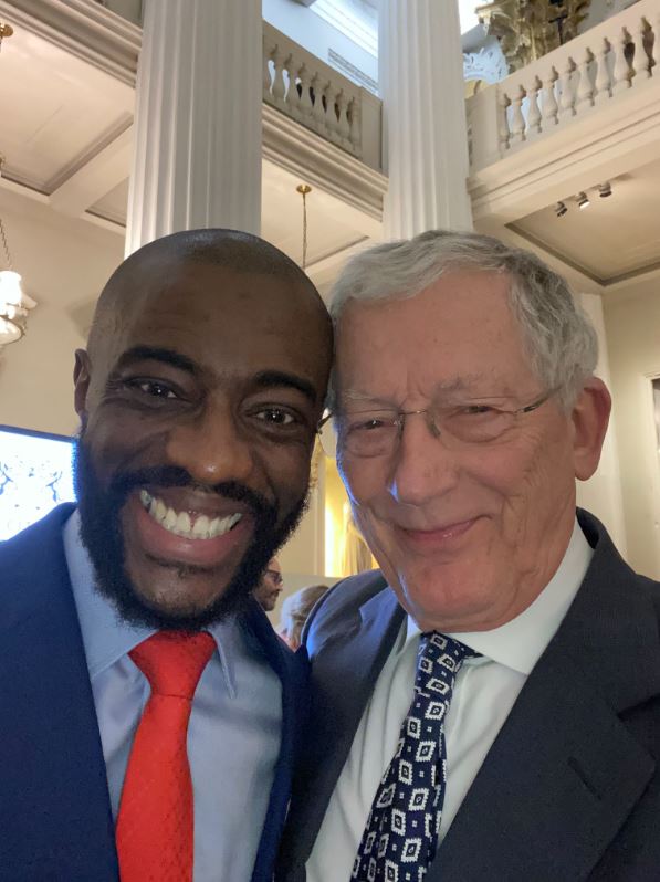 Nick posed for a happy snap with Tim Campbell