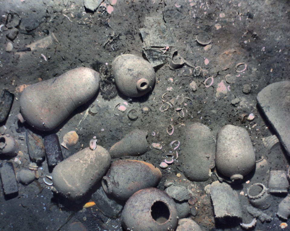 Ceramic jars and other trinkets twinkled among the debris of the disaster