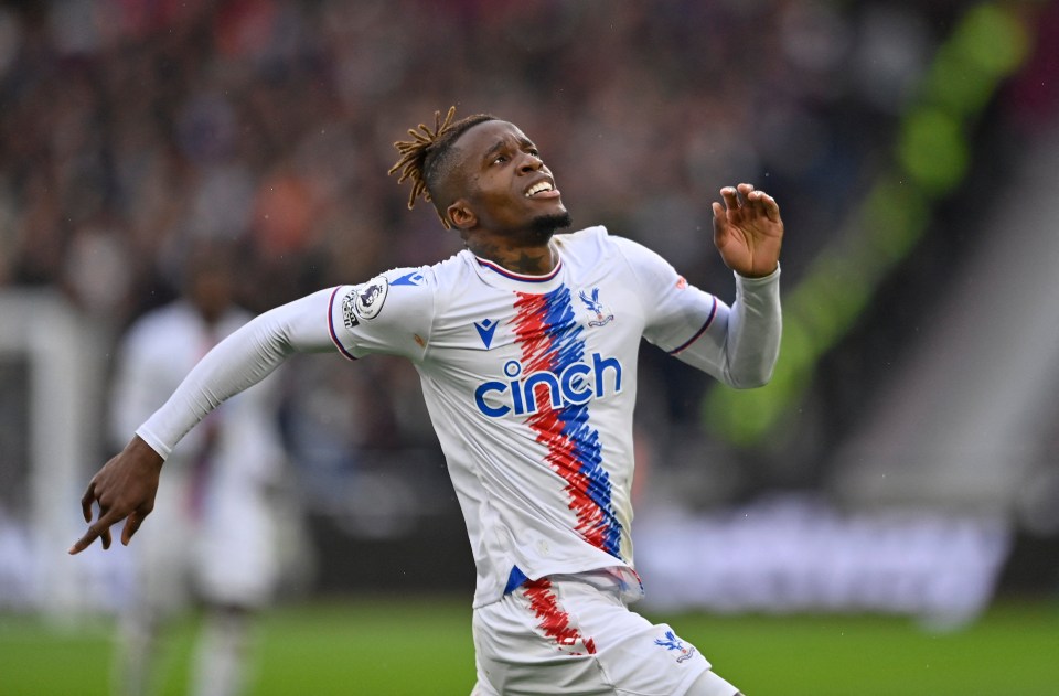 Wilfried Zaha celebrates scoring for Crystal Palace.