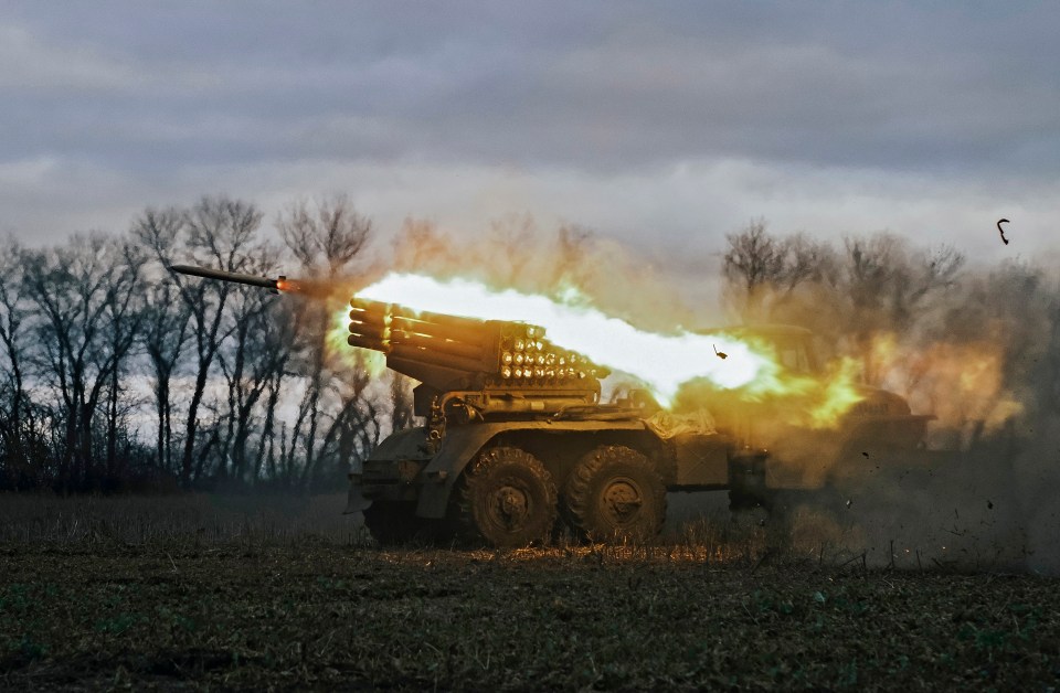 Ukrainian forces fire a multiple rocket launcher at a front line near Bakhmut, Donetsk area