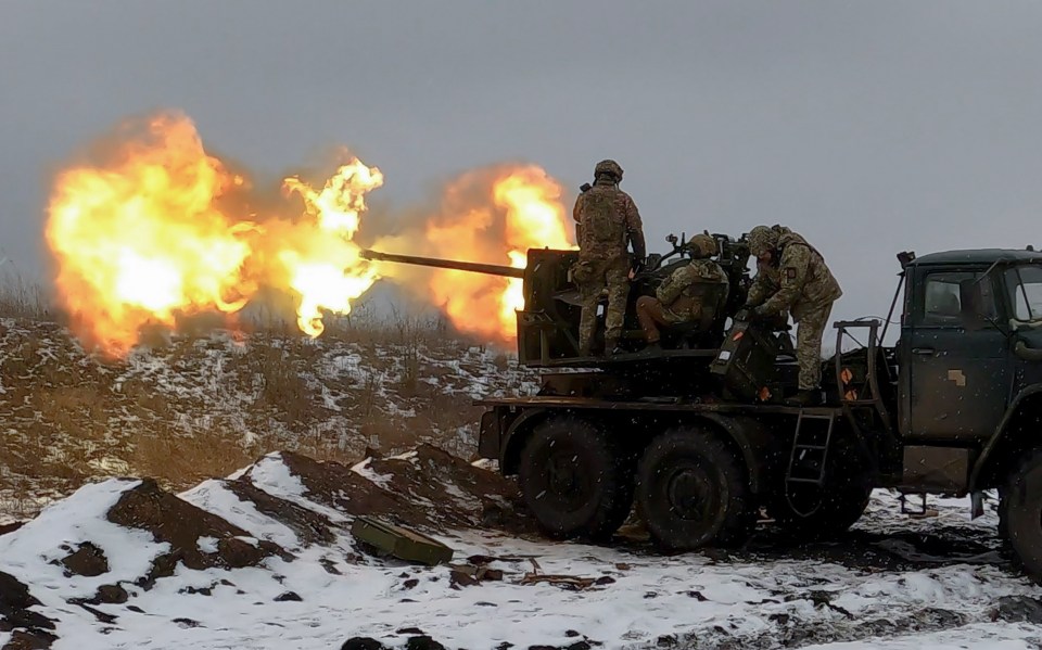 A Ukrainian soldiers firing an anti-aircraft gun at a position near Bakhmut