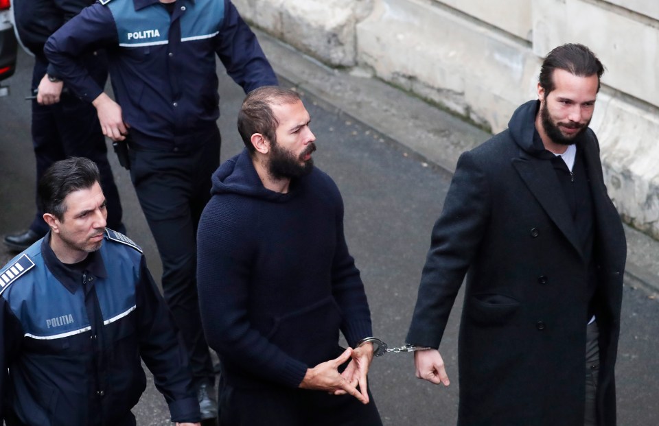 He made strange a hand signal as he arrived at court