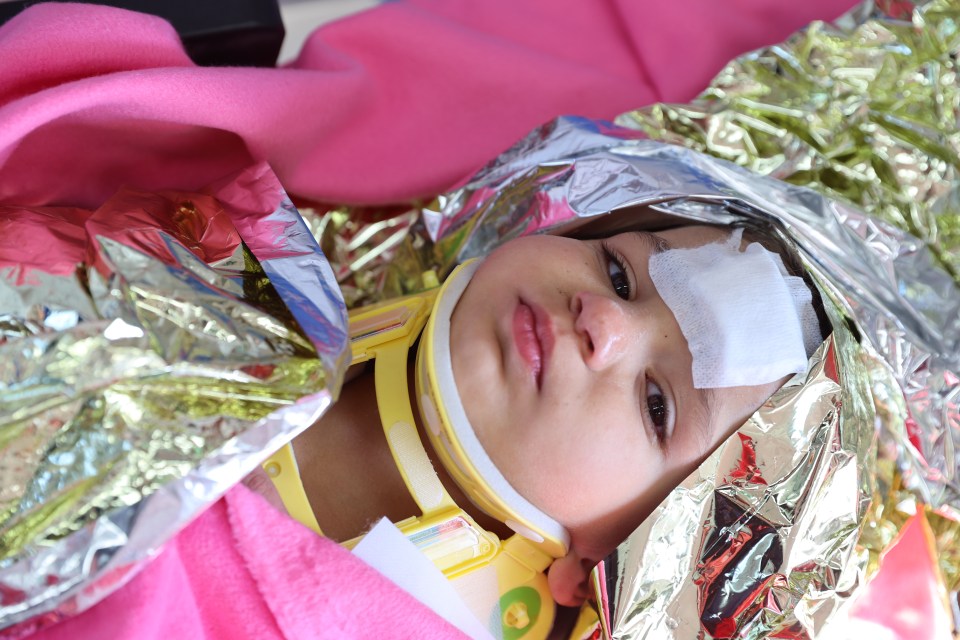 A two-year-old girl found 150 hours after the quake is transferred to the hospital in Adana by a helicopter