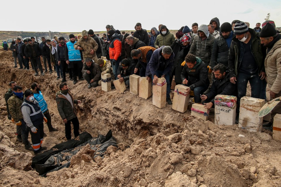 Heartbroken relatives burying their families in Adiyaman, Turkey