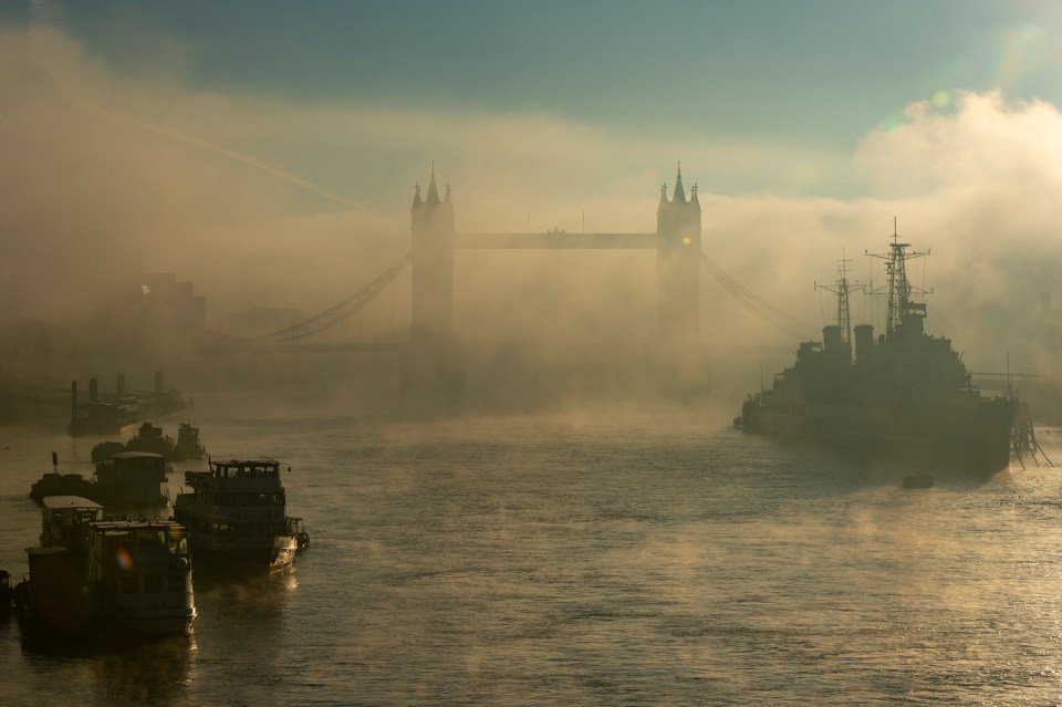 Freezing fog hit parts of the UK this morning - London landmark is shrouded in the early morning mist