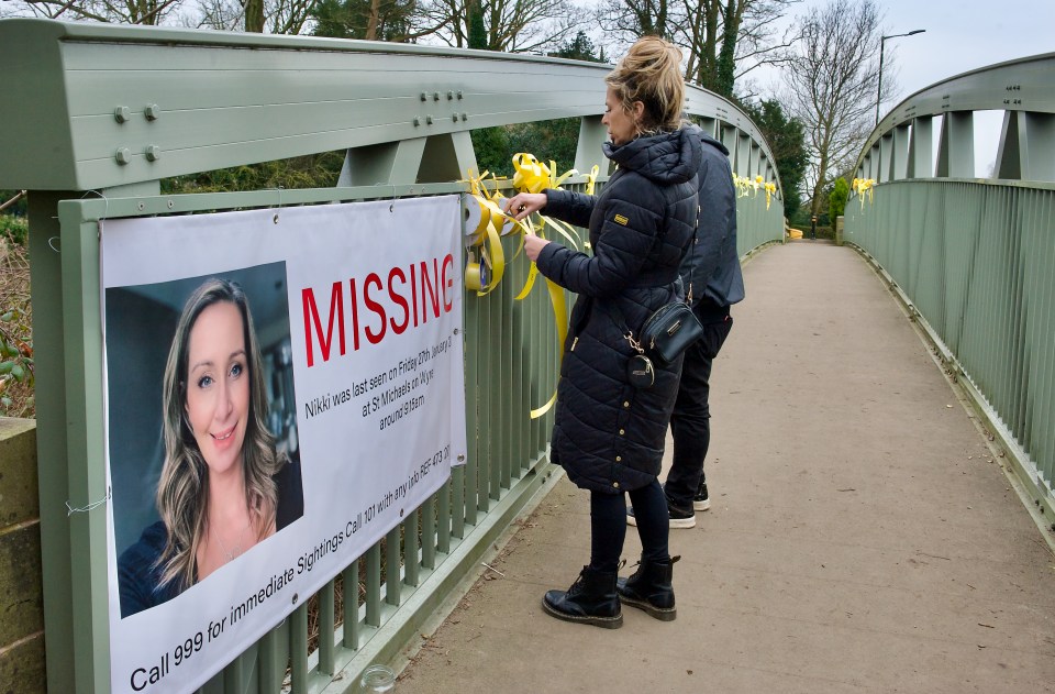 Residents tie yellow ribbons of hope on a bridge close to where Nicola vanished