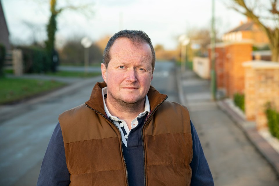 Thoroton resident James Max says drivers racing through puddles have left his children drenched