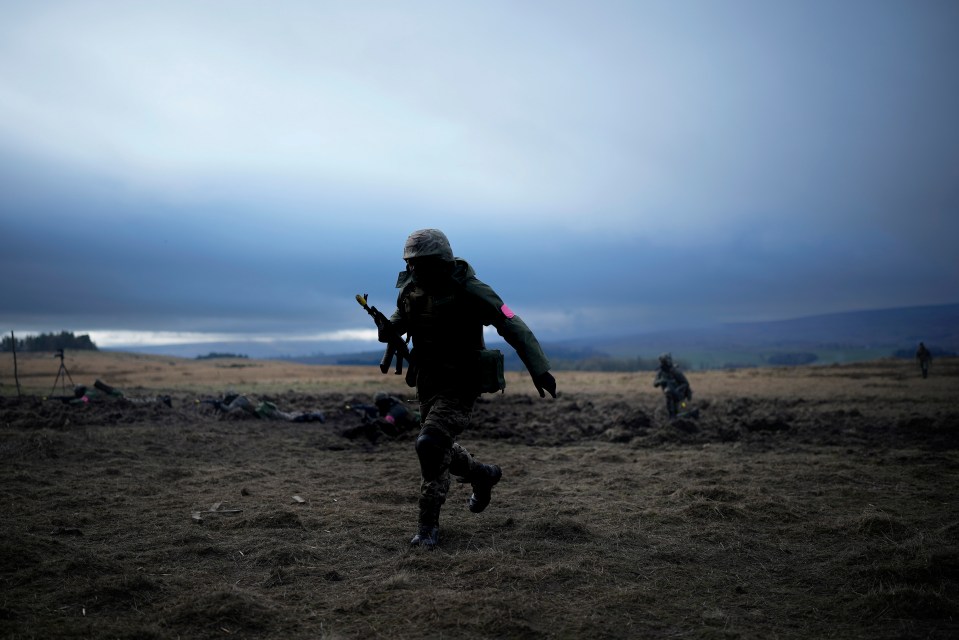 Ukrainian soldiers train in trench warfare exercises with British troops