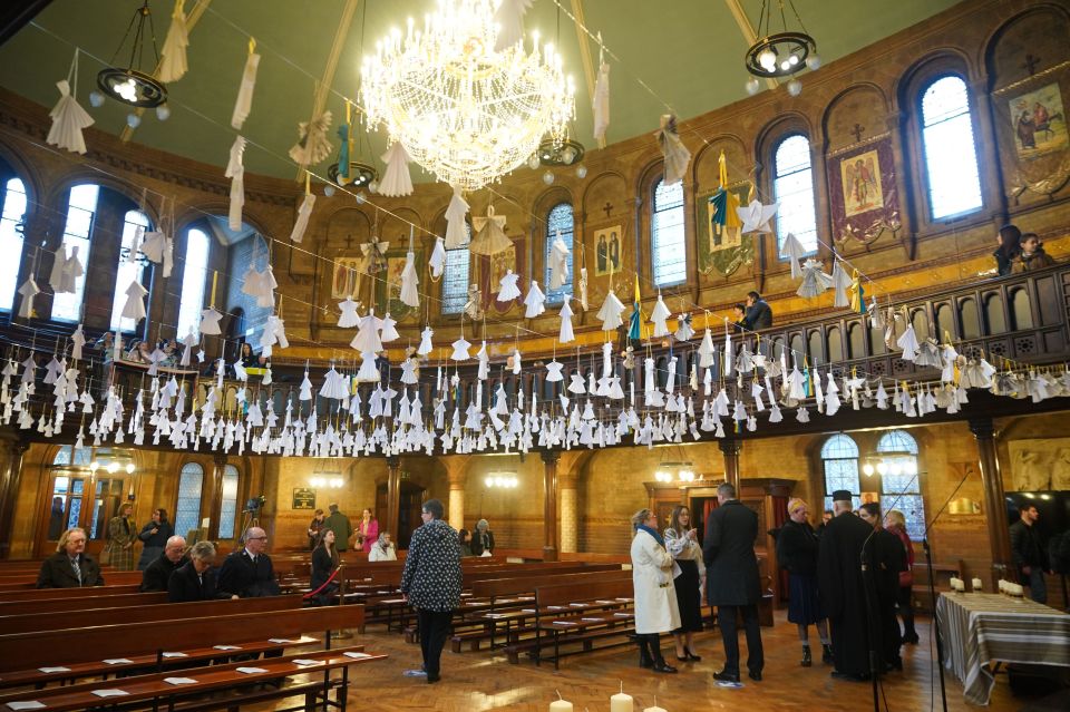 At the Ukrainian Catholic Cathedral in London, 461 paper angels hang from the roof for each child that has died in the war