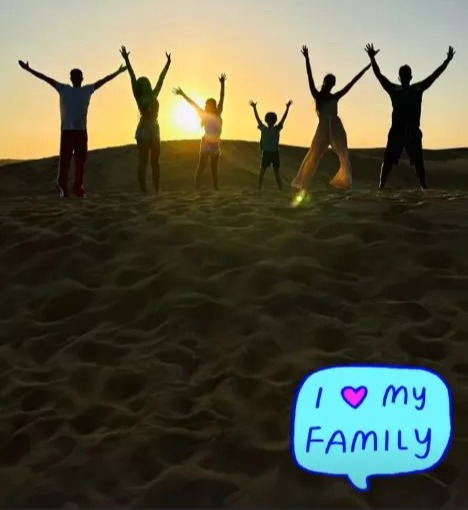 Emily, Pete, Theo, Amelia, Princess and Junior posed in the sand