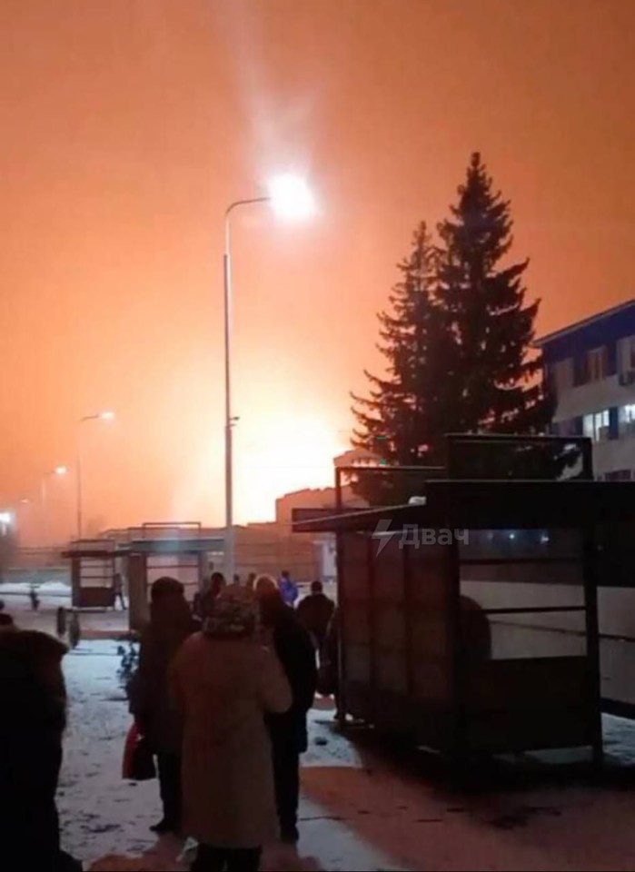 Locals gathered as the blaze lit up the night sky in Russia