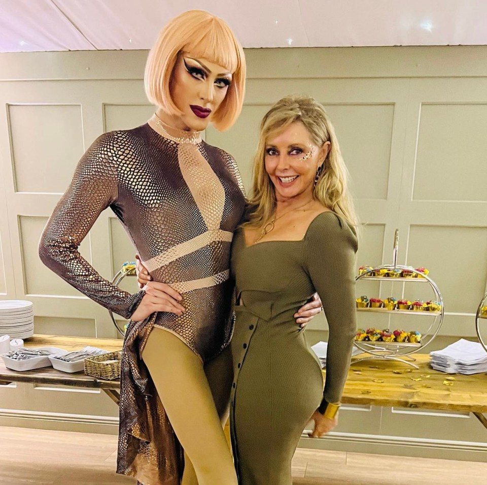 Carol posed alongside one of the cabaret drag artists as she called it a “bl**dy good party”