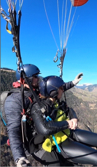 In the video, Laura is seen skydiving in Switzerland