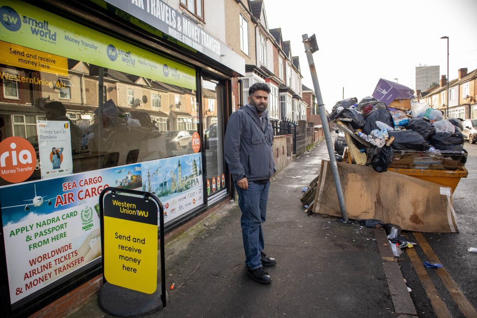 Furious shopkeeper Abrar Khan has lost passing custom because of the smelly skip