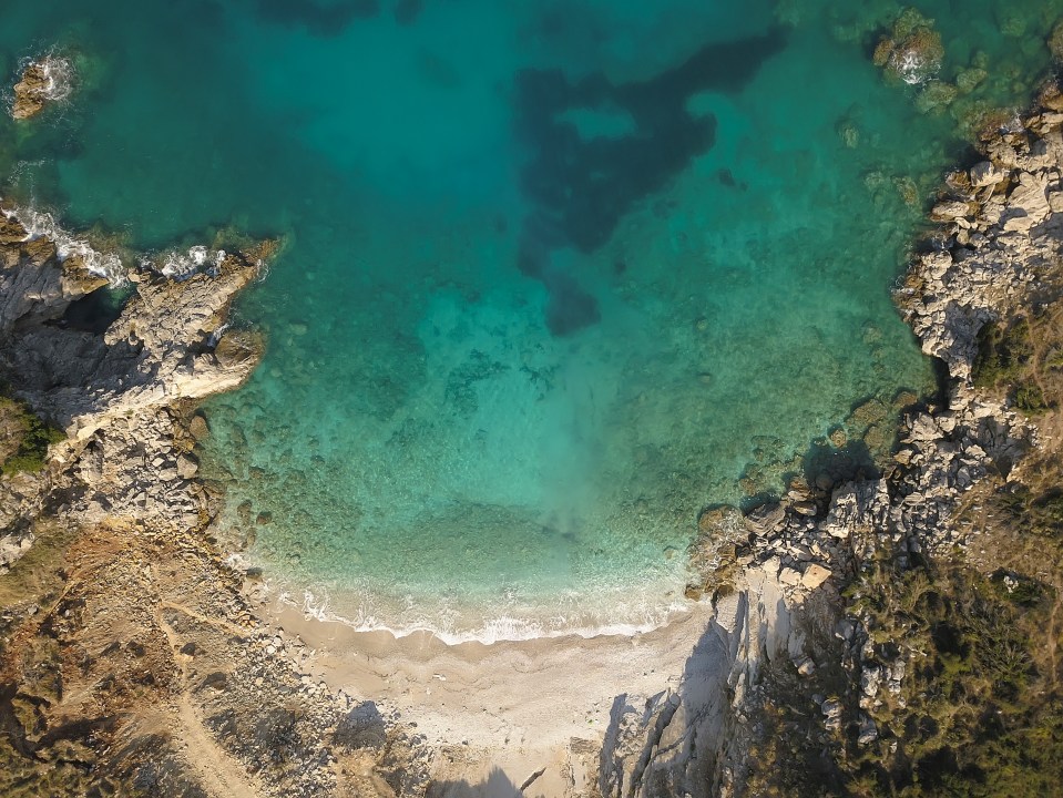 Birdseye view of Mirror Beach (Pasqyra) in Saranda, Albania