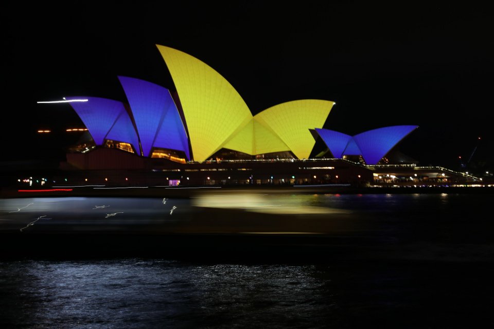 The Sydney Opera House lit up in blue and yellow to show solidarity with Ukraine