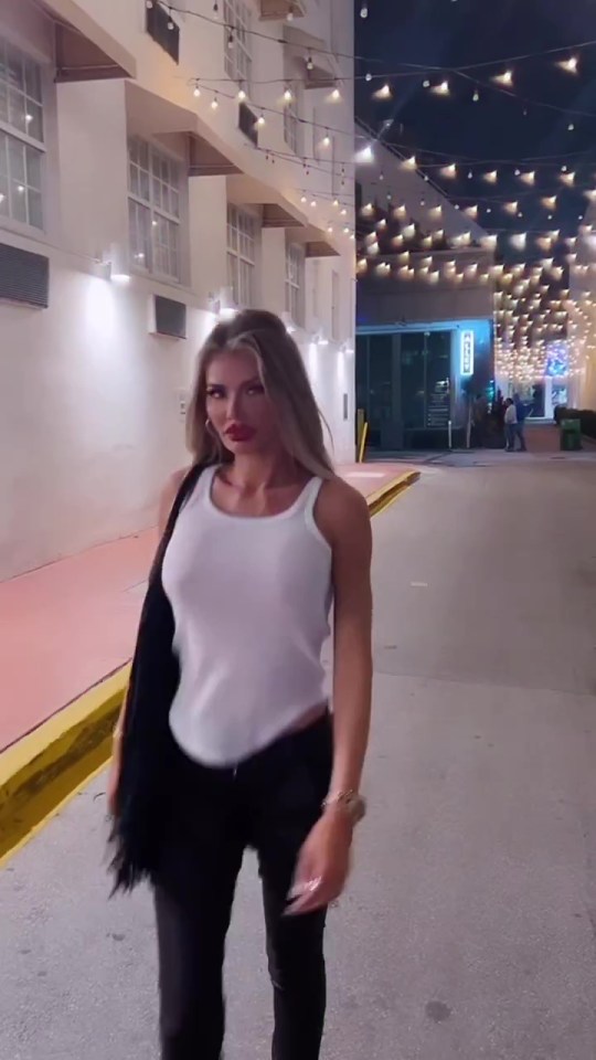 Chloe Sims goes braless as she soaks up the sights of Miami