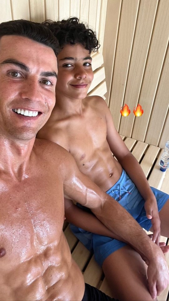 The superstar showed off his six-pack as the pair posed in a sauna