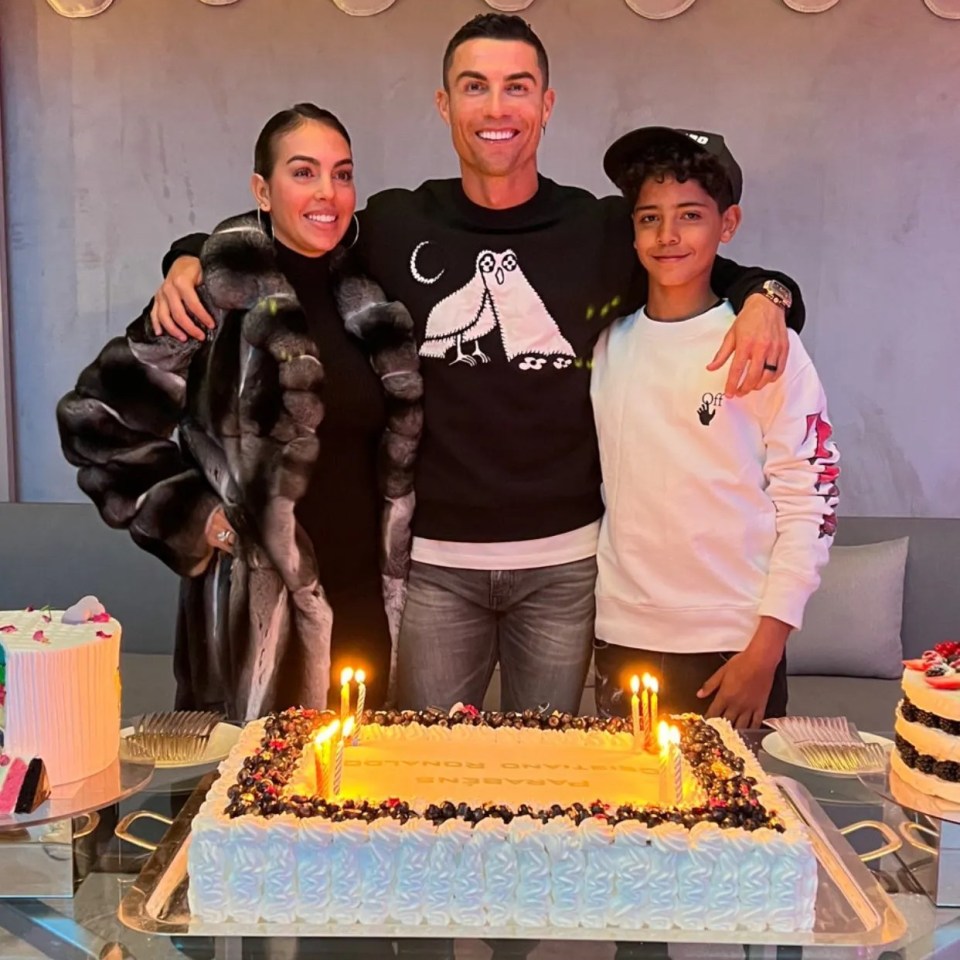 Ronaldo posing with Georgina and his eldest son, Cristiano Jr