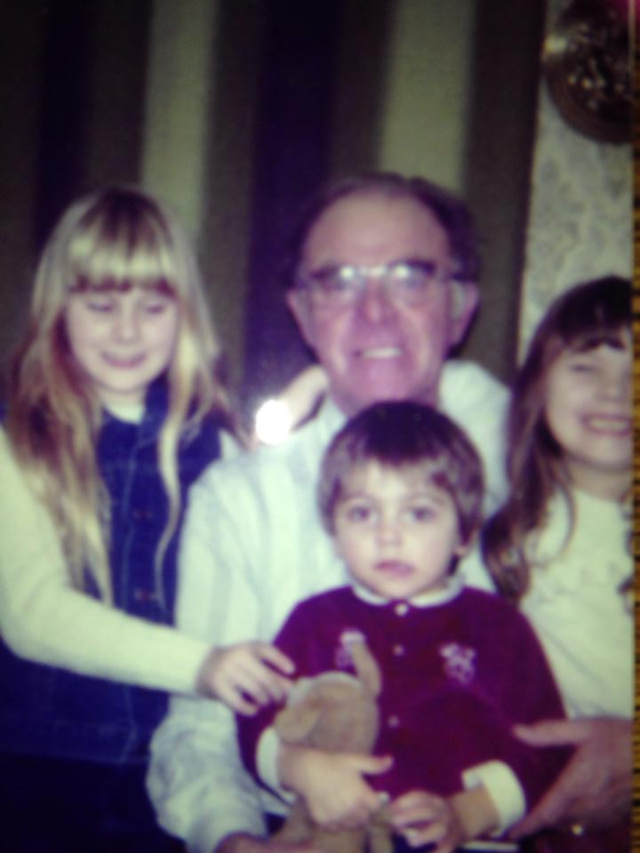 Ross with his dad and siblings as a child