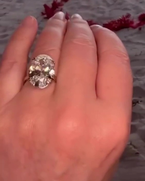 The actress shoed off the enormous diamond ring in a video