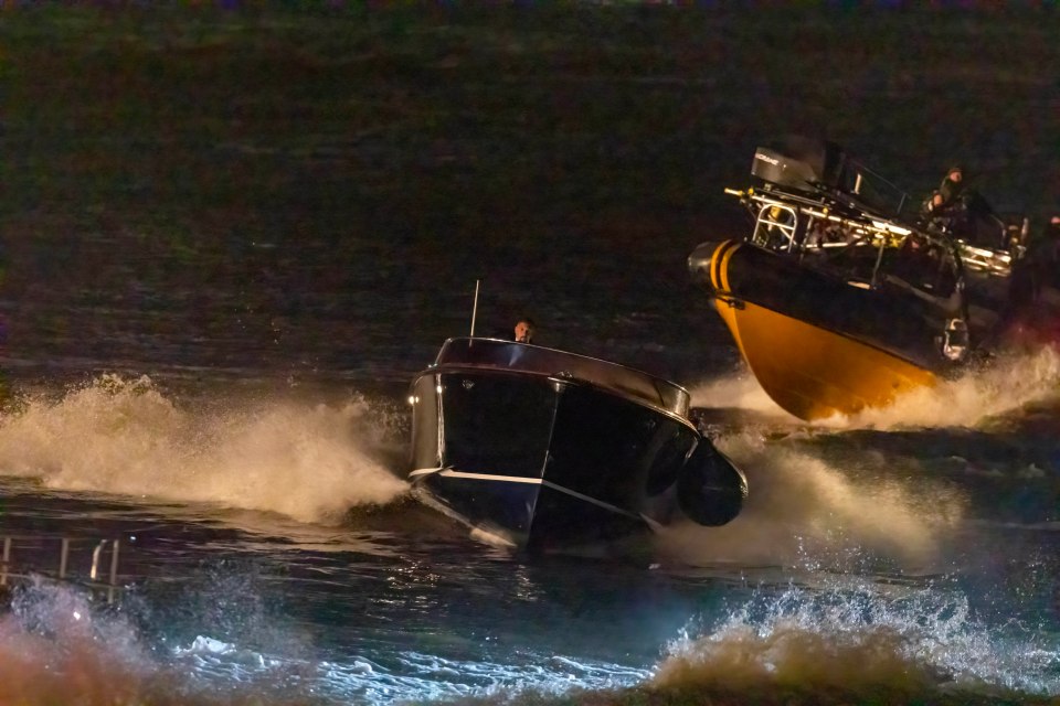 One of the spectacles involved a 'stunt person riding a motorbike from Docklands London on to a barge and up a ramp before landing in the water'